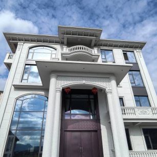 佛山白麻别墅外墙干挂石材效果示例