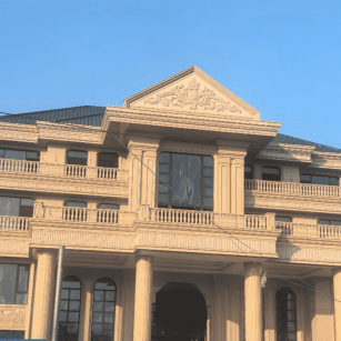 佛山黄金麻别墅外墙干挂石材效果示例