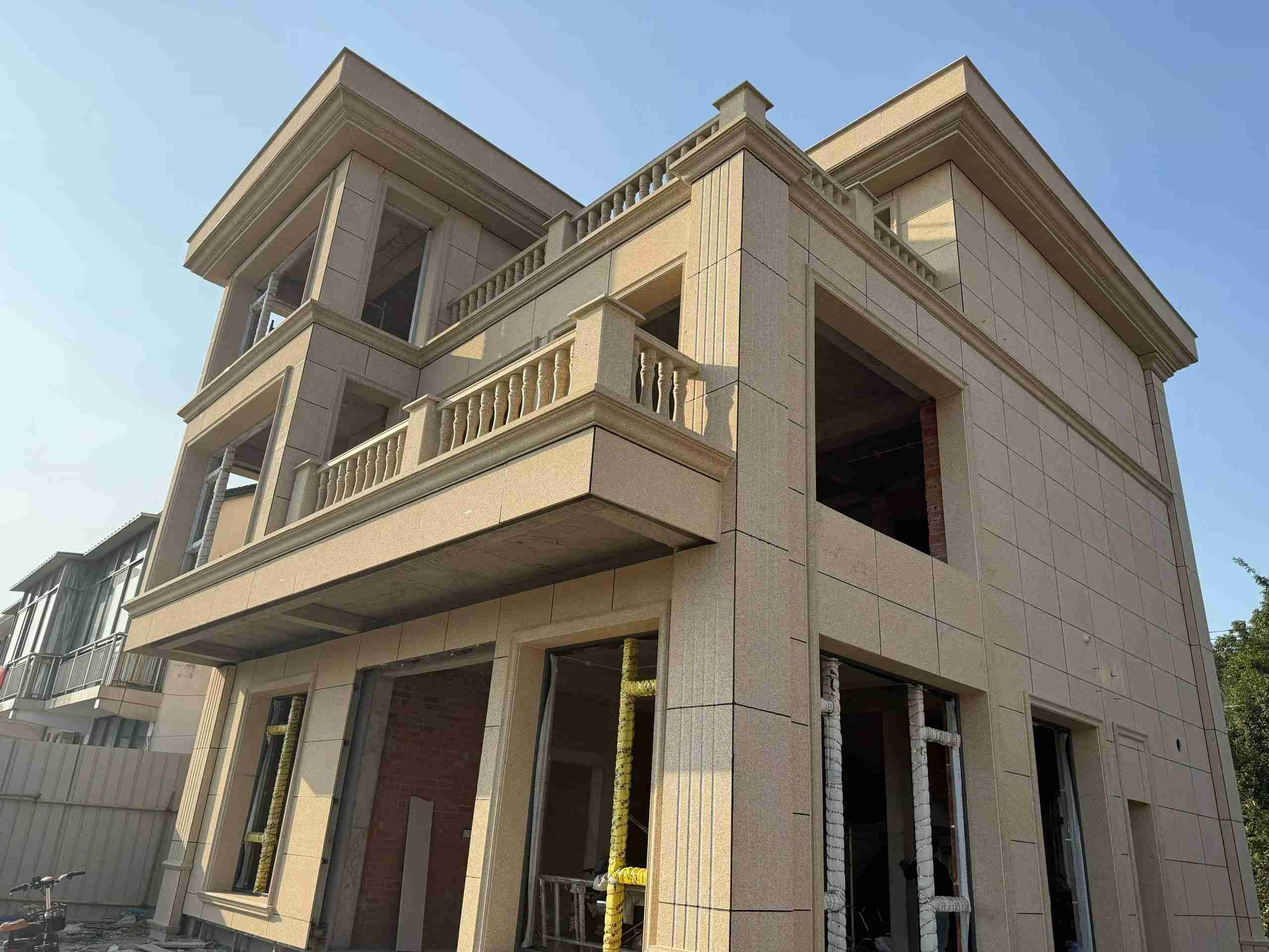 佛山 黄金麻花岗岩石材荔枝面外墙干挂效果展示